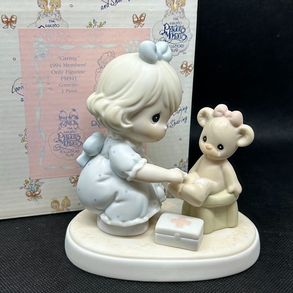 Precious Moments "Caring" 1994 Member's Only figurine